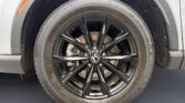 Black Honda alloy wheel and tire
