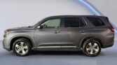 Gray mid-size SUV side profile in studio