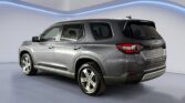 Silver SUV rear three-quarter view in studio
