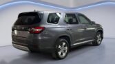Gray SUV parked in modern showroom