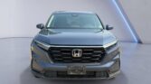 Front view gray Honda SUV in showroom
