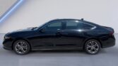 Black sedan car side view in showroom