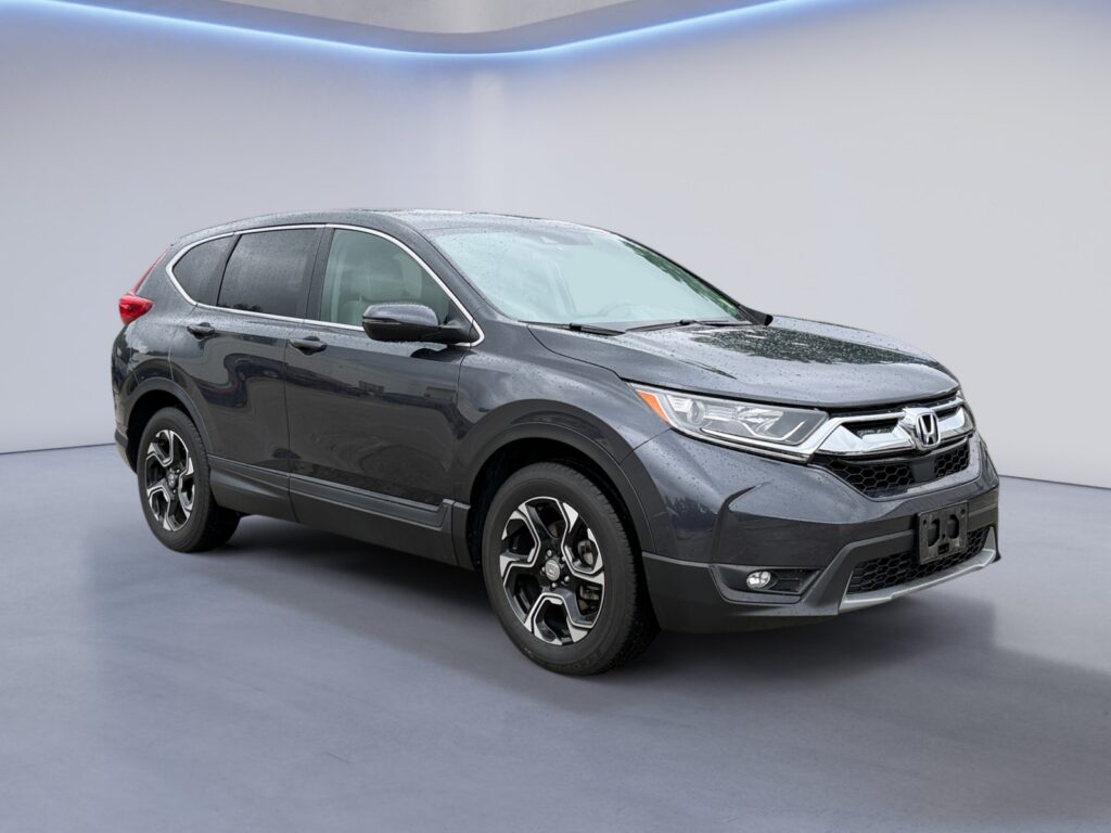 Gray Honda CR-V compact SUV in showroom