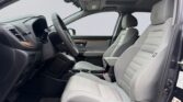 Modern car interior with gray front seats